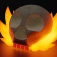 SkullFire.jpg Simplified Flaming Skull (Wee Jas DnD token)