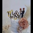 Screenshot_20230916_200229_Messenger.jpg Wedding Topper (Bride and Groom)