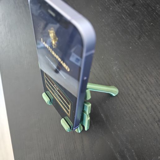Monstera Phone Stand — cable-ready desk holder