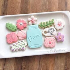 WhatsApp-Image-2022-04-11-at-9.52.33-AM.jpeg jeu de coupe-biscuits pot à fleurs avec fleurs