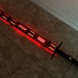 smaller-C8ABCEF85487.jpg Surprise Lightsaber!  Ultra Sabers compatible scabbard