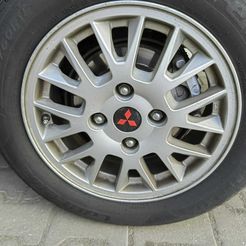 WhatsApp-Image-2023-11-21-at-2.19.26-AM-4.jpeg mitsubishi carisma tire rim logo