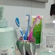 photo_2023-01-05_06-29-59-4.jpg Cute tooth-shaped toothbrush holder