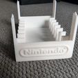 image.png Nintendo 64 - 8 Cartridge Game Holder