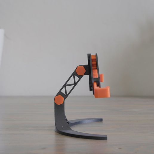 cc4a85df78e2a89c4d1c5b57dd9ad093_display_large.jpg Mechanical Quick Grab/Release Phone Stand