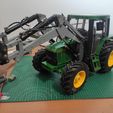 1700557527304.jpg Tractor Front loader hydraulic / electric. Front loader hydraulic / electric for Radio Control tractor.
