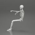 3DG-0012.jpg Skeleton with arm on window driving the car