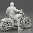 3DG-0010.jpg Young man sitting on his motorbike - Separated and non separated