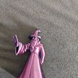 9mao2y.jpg Wizard Figurine — robed mage with a magnet hand