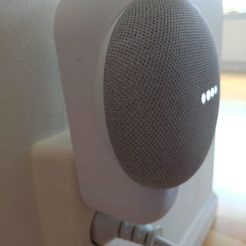 Montaje de la toma de corriente de Google Nest Home Mini, limpio y minimalista
