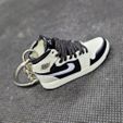 z4605960254651_25a51d4a22adb028da772890c9cae270.jpg Nike Air Jordan Tuxedo Keychain