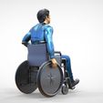 Dis2-.7.jpg N2 Disable man on wheelchair