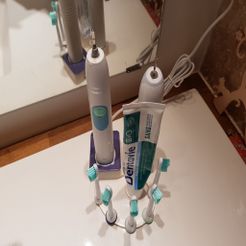 20191117_204527.jpg Five toothbrushes Sonicare stand