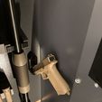 4.jpg MAGNETIC HANGER FOR PISTOLS AND REVOLVERS - 9MM AND UP