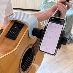 301048752_554596613089071_5443352395096715281_n.jpg Free STL file Guitar Phone holder・3D printer design to download