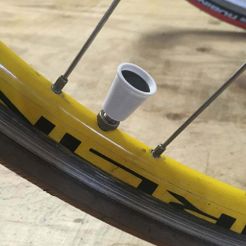 ETSY_arttoys_TUTUGO_Series_I_black-on-bike.jpg Flexible Snap-On Coffee Cup Valve Caps for Bicycles and Cars