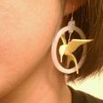 WearingEarring_display_large_display_large.jpg p Earring #3 Hunger Games Mockingjay