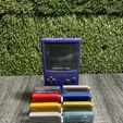 441330991_1108405906938870_330559883731034156_n.jpg GAMEBOY COLOR HOLDER / STAND WITH 8 GAME CARTRIDGES CASES