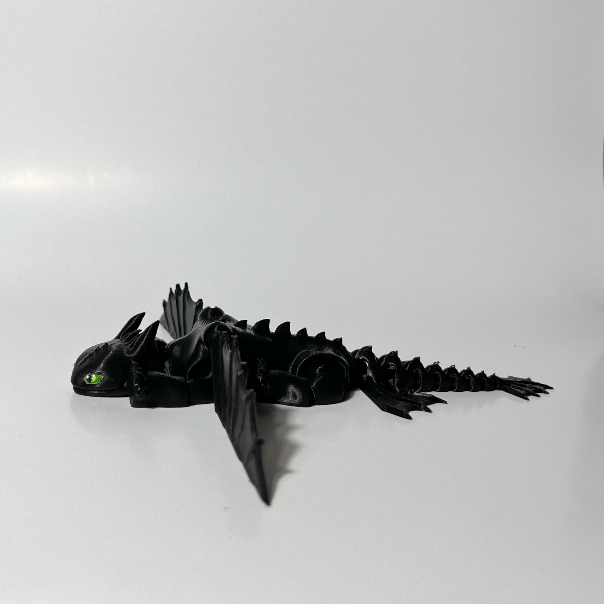 small_Toothless.jpg Fichier STL gratuit Dragon sans dents Flexi・Plan imprimable en 3D à télécharger, Saber3D