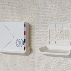 51a96b92-61f0-4721-a6b9-587c2c00ebf5.jpg Free 3D file Phomemo M02S Wall Mount with Stapler or Screws・3D printing idea to download