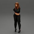 Girl-0006.jpg Mujer joven de pie con ropa deportiva