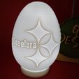 IMG_20231231_214843786.jpg Pittsburgh Steelers FOOTBALL EASTER EGG FILLABLE AND OR TEALIGHT