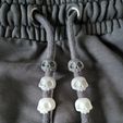 20250302_180547.jpg Cute skull - drawstring beads