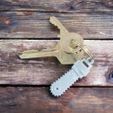 WhatsApp-Image-2023-08-11-at-06.27.14.jpeg Munchkin chainsaw keychain