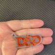 IMG_1201.jpg Dungeons and Dragons Coasters and Keychains