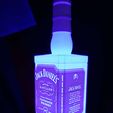 135535106_411075323565997_7850354065977243248_n.jpg Botella de litografía de Jack Daniel's