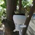 on-the-side-1.jpg Robert Plant Pot Hanging on the Side of a Tree