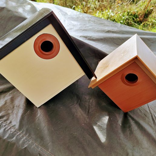 Nesting boxes for small garden birds, titmice, starlings, sparrows