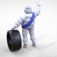 Mim-1.1.13.jpg Michelin man with his tire