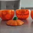 IMG_20230904_134539.jpg Two angry and one surprised Halloween pumpkins (candle holder, plant base, and candy bowl)