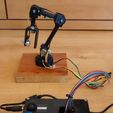 2de40e0d504f583cda7465979f958a98_display_large.jpg Robotic Arm with 5 degree of freedom printed in 3D