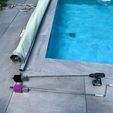 297454739_10227725715865569_2733835059169507166_n.jpg Roller support for pool cover crank handle
