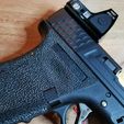 m12.jpg Airsoft Glock G17 Extended Magazine Release