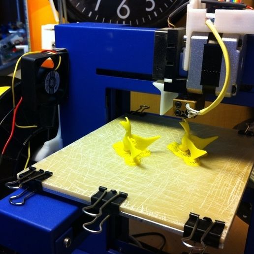 PrintingOnUpPrinter_display_large_display_large.jpg p Boucle d'oreille #3 Hunger Games Mockingjay