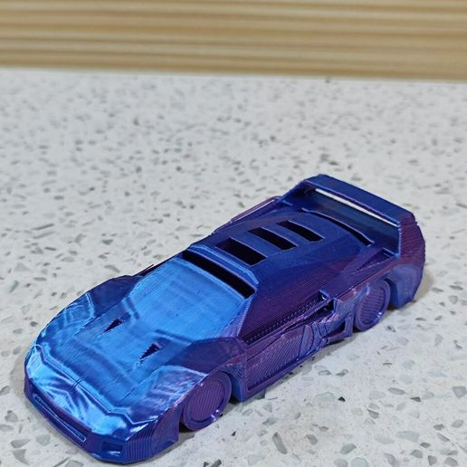 photo_2024-02-11_02-01-44.jpg USB and SD Holder Ferrari F40 Low-Poly (Print-in-Place)