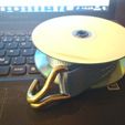 IMG_20190403_231934.jpg Cargo strap spool with old CDs
