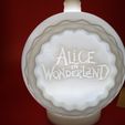 IMG_20230907_115934178.jpg Alice In Wonderland CHRISTMAS ORNAMENT TEALIGHT WITH TWIST LOCK CAP