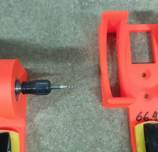 canTool_how_to_use2_r.jpg Supports for cutting can lids with a Dremel tool