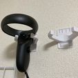 bcf0f99e9fabd83b77788a8d3aa11df6_display_large.jpg Oculus Quest Controller Montage mural avec agrafeuse et vis