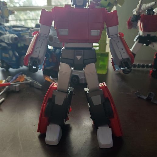 Fans Toys Side Swipe / Rambo leg covers.