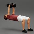 Girl-0006.jpg Muscular man working out in gym doing exercises with dumbbell chest