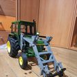 1700557096493.jpg Tractor Front loader hydraulic / electric. Front loader hydraulic / electric for Radio Control tractor.