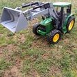 1700554494343.jpg Tractor Front loader hydraulic / electric. Front loader hydraulic / electric for Radio Control tractor.