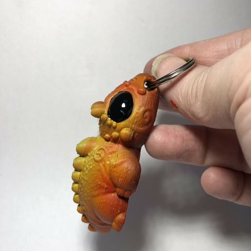 H9rXmMH2R8qElKxV-hrlBg.jpg Dragon Keychain flop