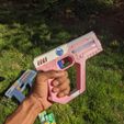 mintray-tic-tac-pink-hand.jpg MintRay - Tic Tac Shooter for Safe and Fun Play