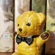 20241219_140758.jpg Cute sitting teddy bear figure.